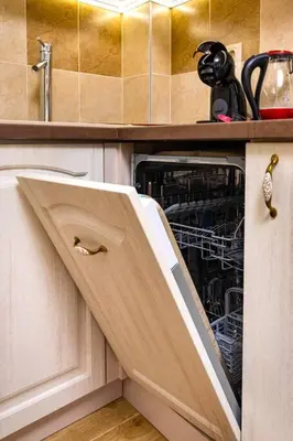 a dishwasher with its door open in a kitchen at Central Park Apartment Dragan Tsankov in Plovdiv