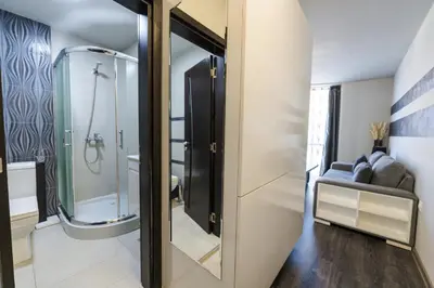 a bathroom with a shower and a glass door at Dias in Sandanski