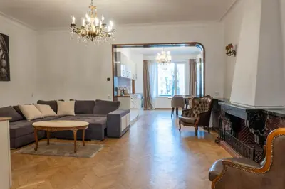 a living room with a couch and a fireplace at Apartament 86 in Sofia