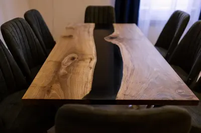 a wooden table in front of a group of chairs at 3BDR, Top Center Retreat, Sofia Heart, FREE Parking in Sofia