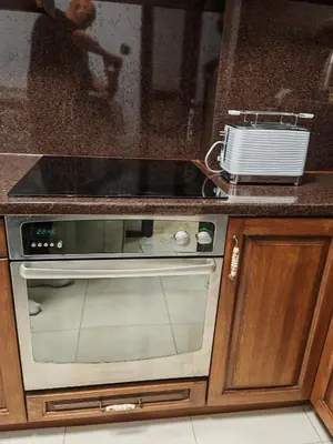 a kitchen with a stove and a toaster at Apartament 88 in Sofia