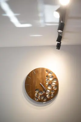 a clock hanging from a ceiling in a room at Top Center Retreat, Near AUBG FREE Parking in Blagoevgrad