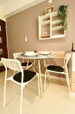 a dining room with a table and chairs at INB Banishora Spot in Sofia