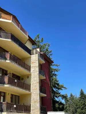 a building with balconies on the side of it at Borovets Boutique Apartment Sequoia II in Borovets