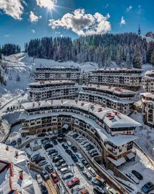 an aerial view of a resort in the snow at Yanevi Apartments at Grand Monastery Pamporovo in Pamporovo