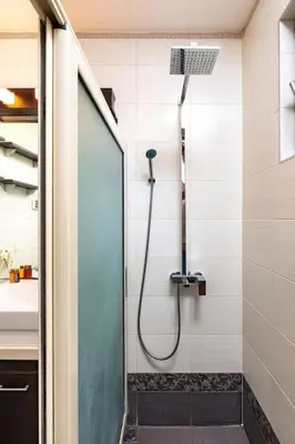 a shower in a bathroom with a glass door at Quiet Apartment in Plovdiv Ricky Home in Plovdiv