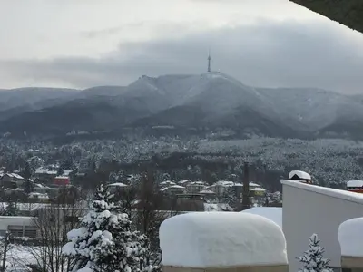 a view of a mountain with snow on the ground at АПАРТАМЕНТ ЗА ГОСТИ 