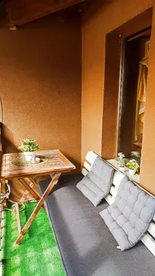 a room with a table and two chairs and a table and a table and chairs at Guest House Chepelare in Chepelare