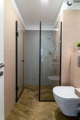 a bathroom with a shower and a toilet at Vintage Parkside whit Free Parking near Center in Plovdiv