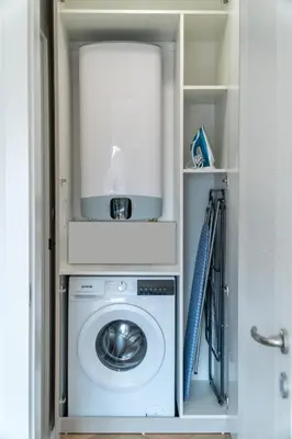 a laundry room with a washer and dryer at Vintage Parkside whit Free Parking near Center in Plovdiv