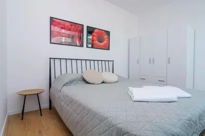 a bedroom with a bed with two pillows on it at My Campus 1 bdrm, Romantic, Panorama view, Free parking, Self check-in in Sofia
