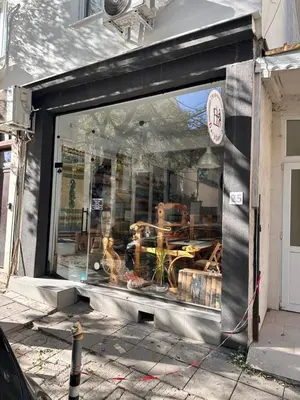 a store front window of a store at Prime Stays at 34 Bratya Miladinovi Street in Sofia