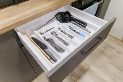 a white drawer with tools in it on a kitchen counter at LDV 13 Residence Free private parking in Plovdiv