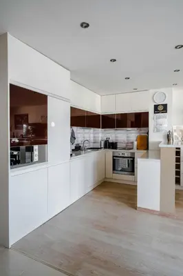 a kitchen with white cabinets and a counter top at Spacious 2BD Flat with Secure Free Parking by Flat Mаnager in Sofia