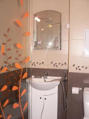 a bathroom with a sink and a mirror at Stay Nexus Galaxy Center in Sofia
