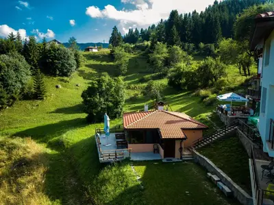 an aerial view of a small house with a roof at Guest House Panorama in Gela