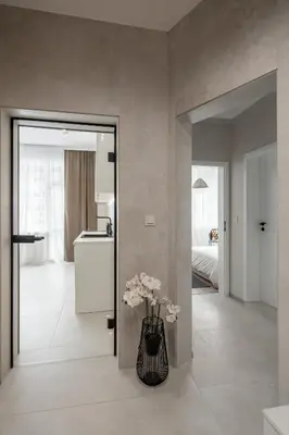 a living room with a vase with flowers in it at Top Centre Bright & Sunny Stylish Apt with 2BDR and 2BTH in Sofia