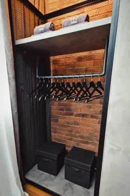 a view of a wine rack with two bottles at AGIA 2 - cozy one room apartment in Sofia