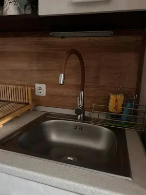 a sink with a faucet in a kitchen at B8 Luxury Studio Apartment in Green Life Bansko in Bansko