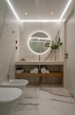 a bathroom with a sink and a mirror at Sentro Boutique Hotel in Sofia