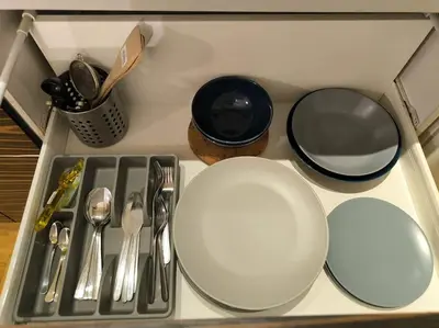 a kitchen counter top with a plate and utensils at Mycampus 1 bdrm, stay 4, free parking, garden, self check-in in Sofia