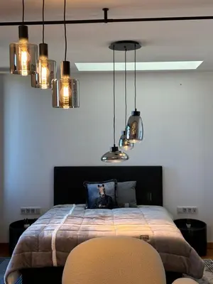 a bedroom with a large bed with several lights at Sofia Rooftop Red Apple in Sofia