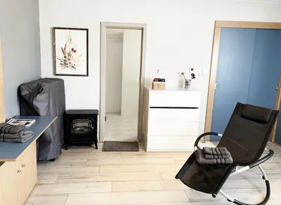 a room with a desk and a chair in it at Bellevue Appart Centrum in Plovdiv