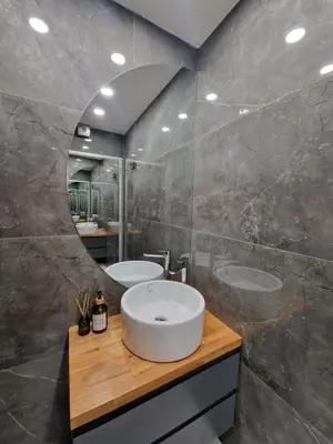 a bathroom with a sink and a mirror at Daisy Garden by the Church in Razlog