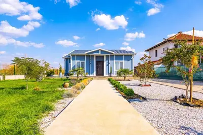 a house with a pathway in front of it at Casa Marincheshki in Orizari - 6км to Plovdiv in Orizari