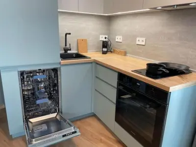 a kitchen with a counter and a stove and a sink at Via421 by COSHER in Sofia