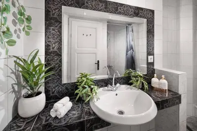 a bathroom with a sink and a mirror at Your Spacious Home With Terrace & 3 Acs in Sofia