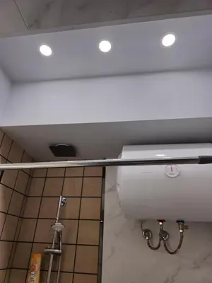 a bathroom with a white toilet in a room at New Premium COZY apartment in the center next to NDK in Sofia
