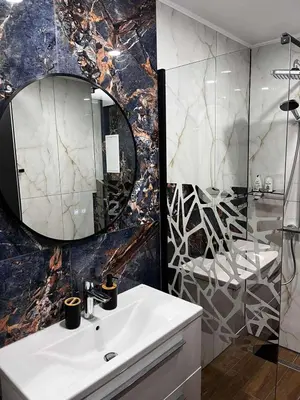 a bathroom with a sink and a mirror at Apartmenthaus Oborishte 2-3-10 in Panagyurishte