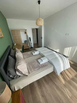 a bedroom with a large bed in a room at Platinum Luxury Industrial Unit City-Center in Plovdiv