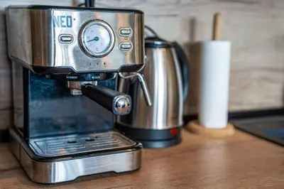 a coffee maker sitting on top of a table at Getaway 2 Bedroom Dream Apartment - free parking in Bansko