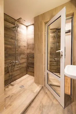 a bathroom with a shower and a sink at Stylish apartment, Top center! in Sofia