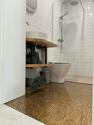 a bathroom with a tub and a glass shower at Newly Built Family Villa with a Hot Tub in Sopot