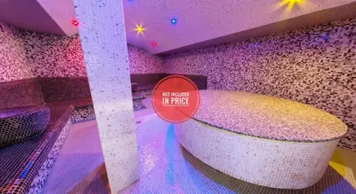 a bath tub in a room with a sign on it at Belvedere Holiday Club 2Bedroom Apartment F201 in Bansko