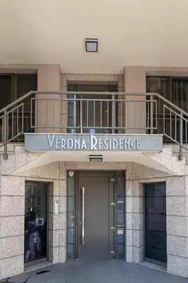 a building with a sign that reads verona residence at Center Apt - Free parking - Walk to Main Street in Plovdiv