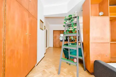 a room with a green ladder in a room at Creative 70s-Inspired Stay Center Parking in Sofia