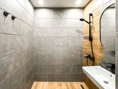 a bathroom with a shower and a sink at Work Friendly 2BR AC Terrace Str Parking in Sofia
