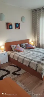 a bedroom with a bed with two pillows on it at Gondola area, Cedar Lodge 4, apart D30, Bansko in Bansko