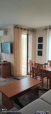 a living room with a table and chairs and a dining room at Gondola area, Cedar Lodge 4, apart D30, Bansko in Bansko
