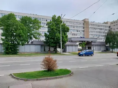 an empty street in front of a large building at Independent studio in a house in the city in Sofia
