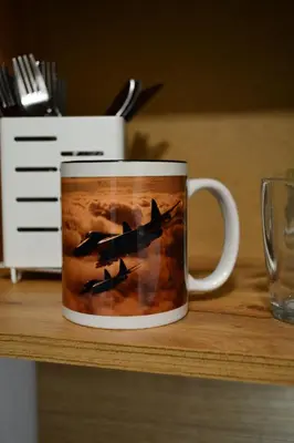 a coffee mug with a picture of a fighter jet at TOP Center, basement fl, 7 beds, 10min from Serdica in Sofia