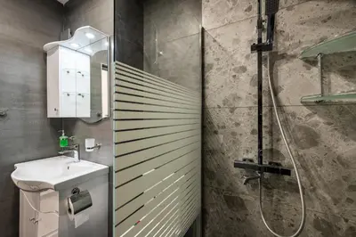 a bathroom with a sink and a shower at The Secret Paradise in Sofia