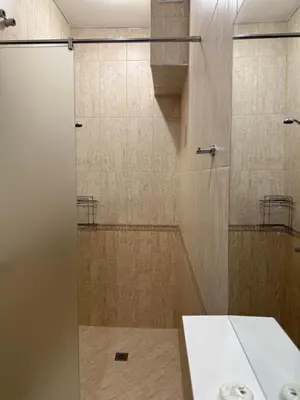 a shower with a glass door in a bathroom at Къща за гости Савана, Пловдив,Plovdiv, летище Пловдив, Plovdiv Airport,Ягодово in Yagodovo