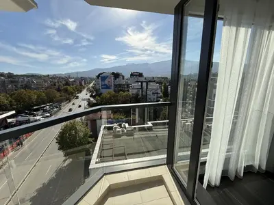 a balcony with a view of a city at AveNew Luxury Apartment 3 in Sofia