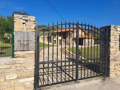 an iron gate in front of a building at Casa Lavandula in Sredno Gradishte