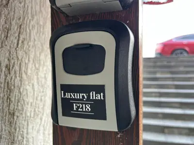 a cell phone holder on the side of a wall at Luxury flat F218 in Bansko